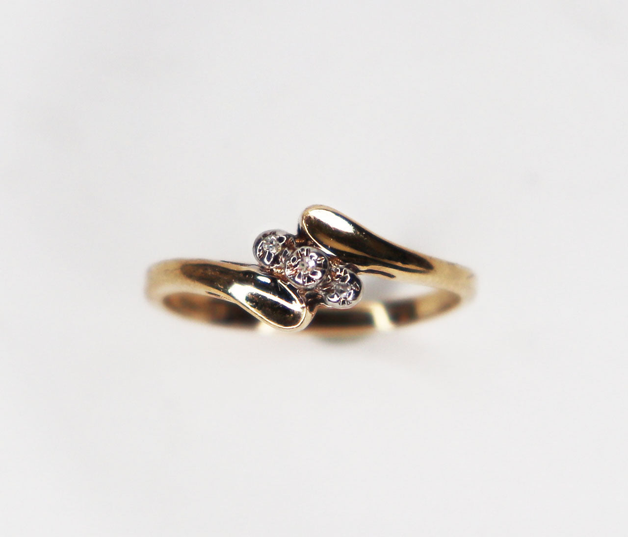 Vintage three stone bypass ring