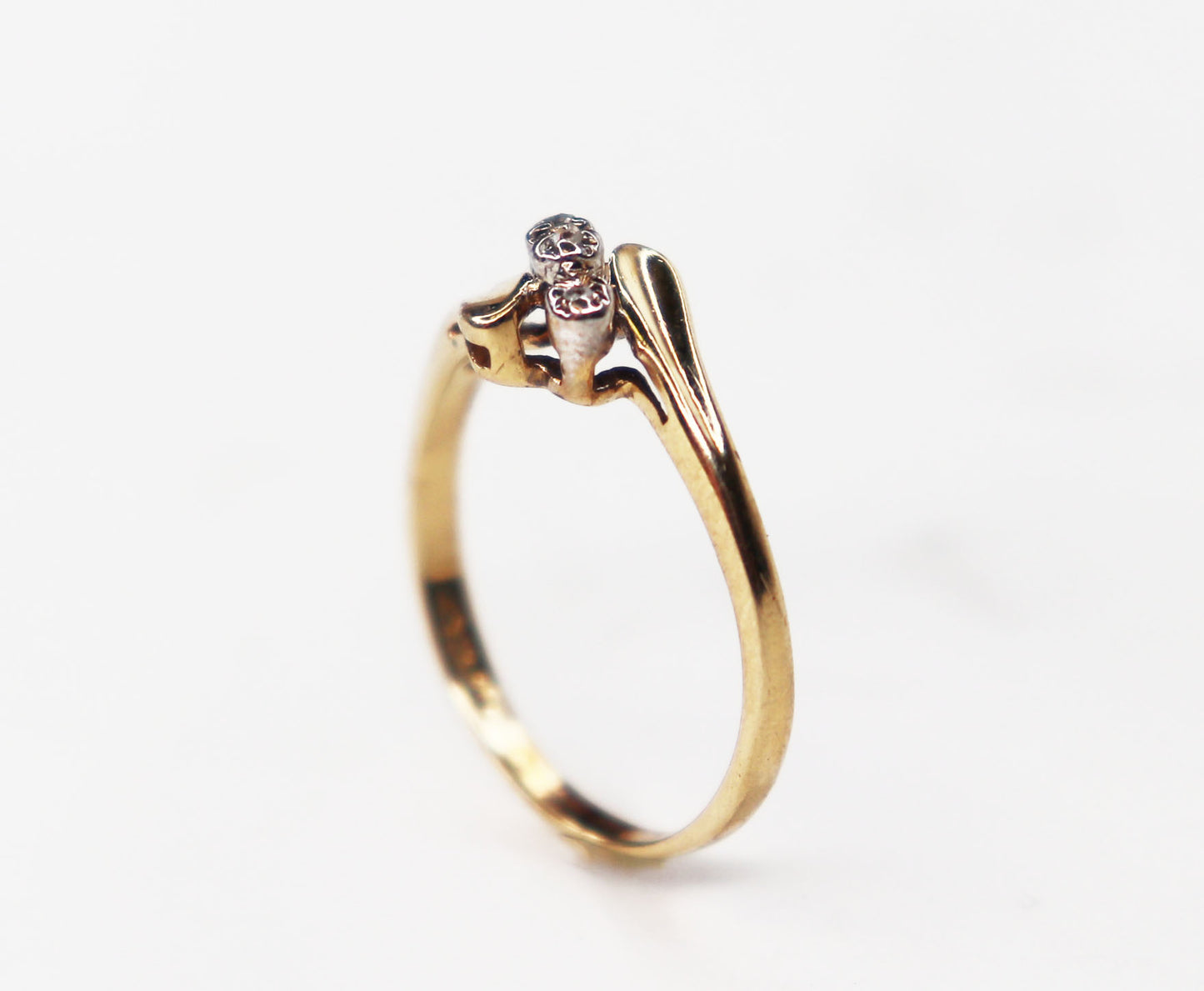 Vintage three stone bypass ring